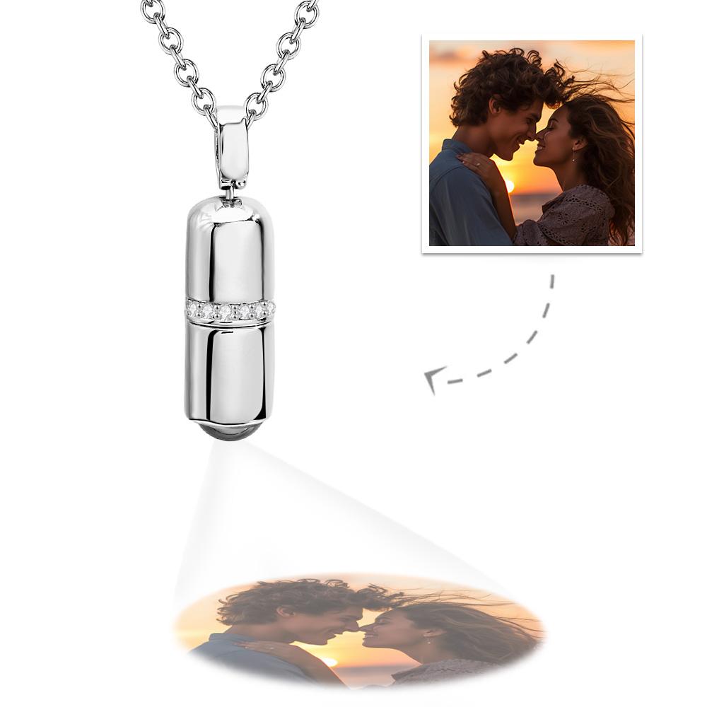Custom Projection Necklace: Silver pill pendant, displaying a projected photo, ideal as a romantic couple gift.