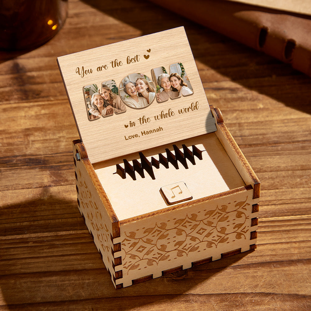 Personalized wooden music box for Mom, engraved with 'You are the world,' a heartfelt Mother's Day gift