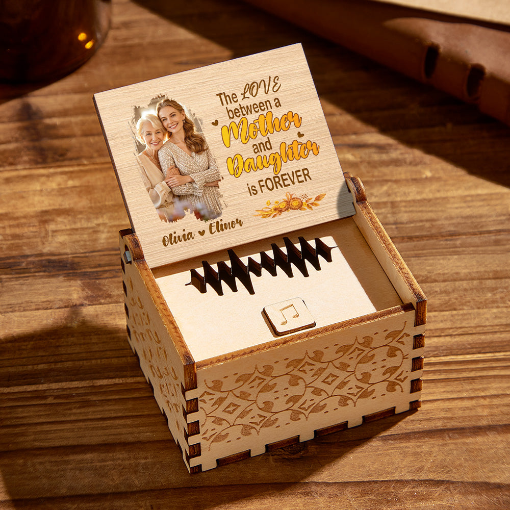 Personalized wooden music box for mother and daughter. Engraved photo and message.